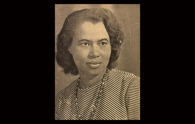 headshot of woman with necklace