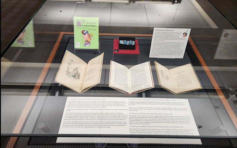 Collection of Jane Austen books and a bracelet.