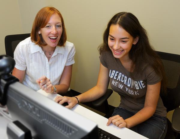 staff member conducting a usability test with a user