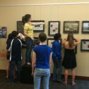 Students installing exhibit