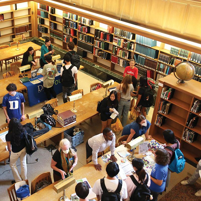 people speaking in lilly library